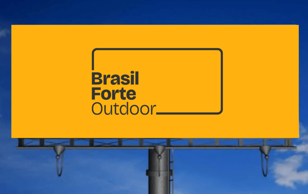 Outdoor em Bertioga, SP, exibindo anúncio publicitário em área de grande circulação.